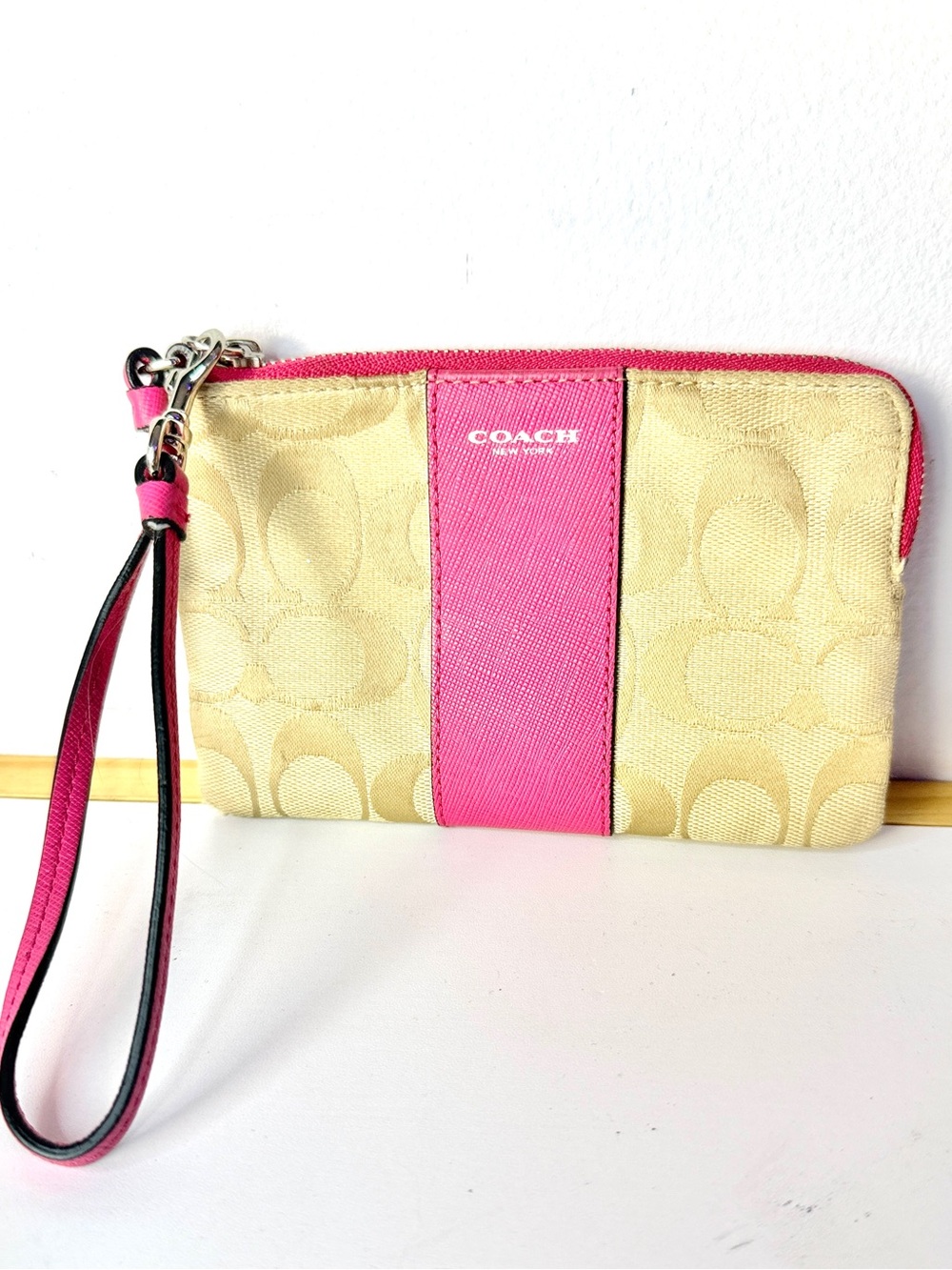 COACH Signature Canvas Wristlet in Beige and Pink